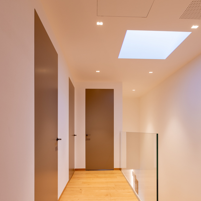 Image of a house corridor illuminated with Sharp.